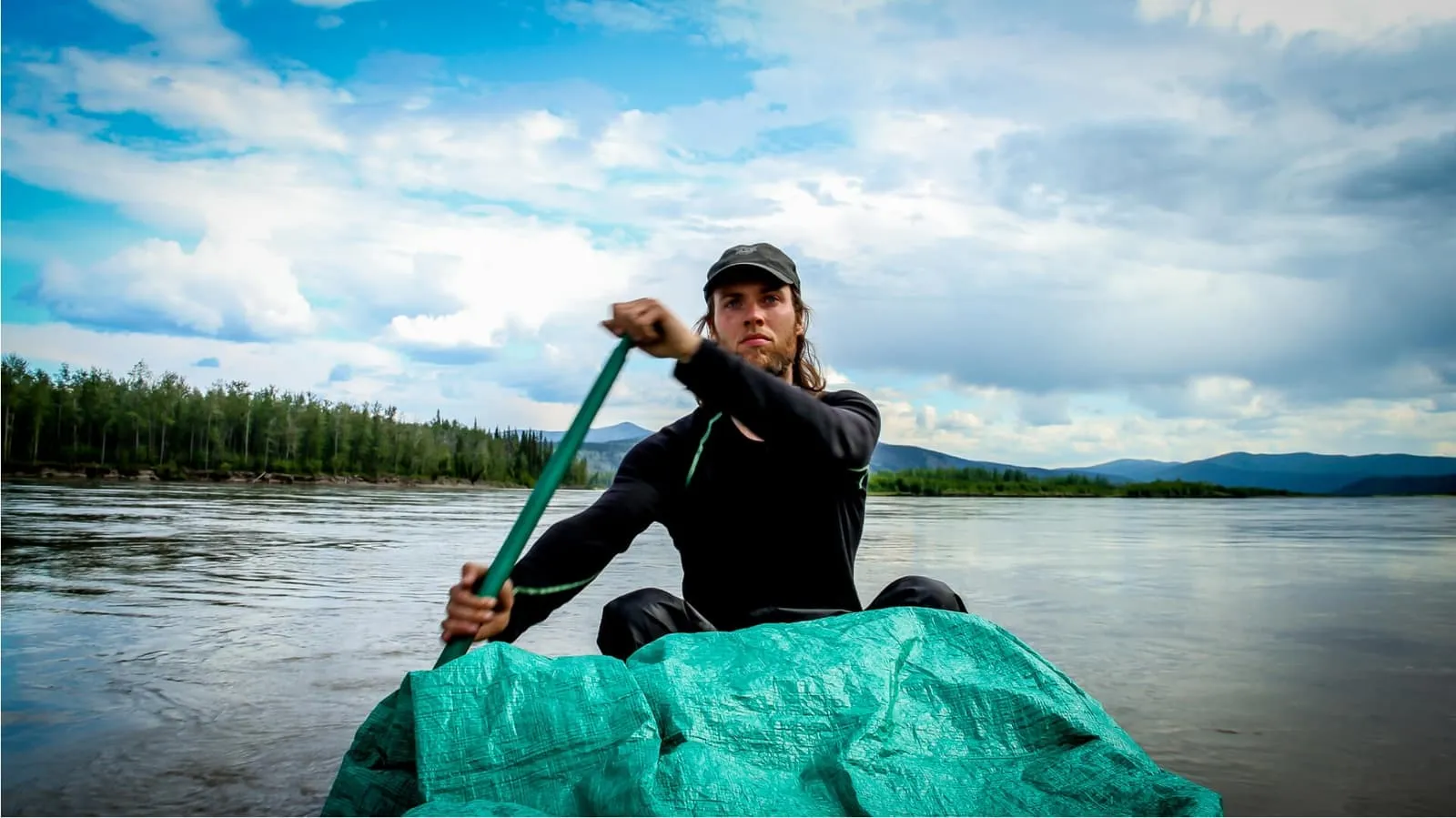 Our founder George paddling his canoe