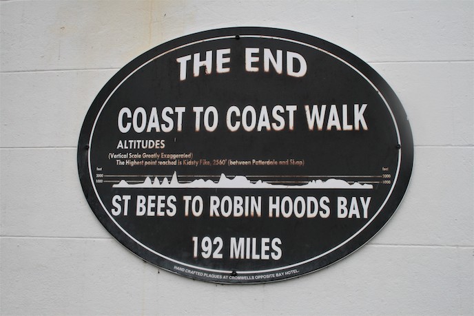 Coast to coast walk st bees to robin hoods bay sign at end of the route
