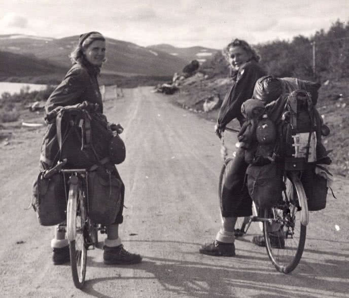 History of bikepacking two ladies with bikepacking bags 3