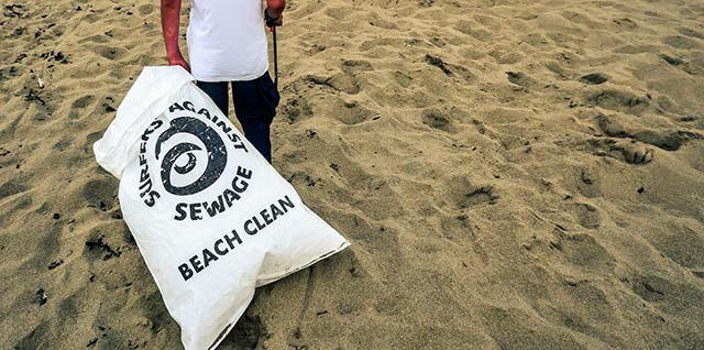 beach cleaning surfers against sewage