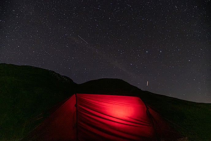 wild camping under the stars in red hilleberg tent in Snowdonia